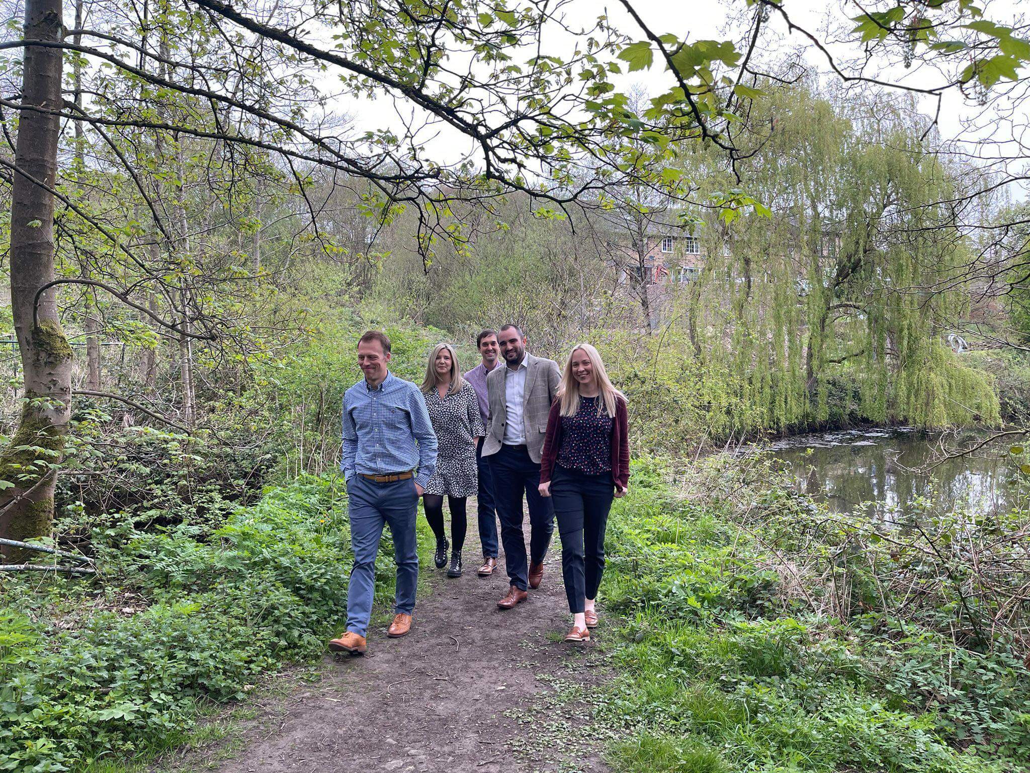 hourglass team walking in park