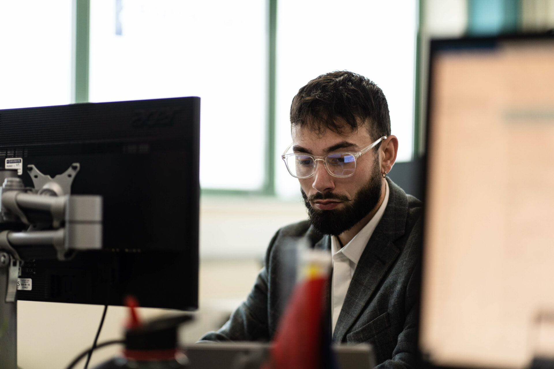 male working at a computer