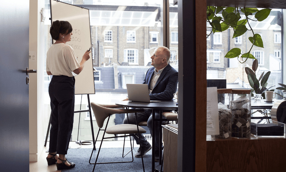 image of two people in a meeting