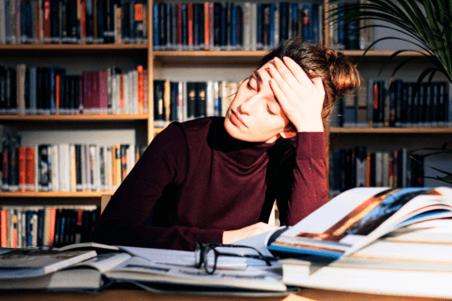 Teacher looking overwhelmed and anxious during during exam season